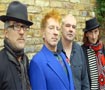 PiL Rehearsals, London, November 2009 (left to right: Bruce Smith (Drums), John Lydon (Vocals), Scott Firth (Bass), Lu Edmonds (Guitar)) Photo by Dave Wainright © Public Image Ltd 2009